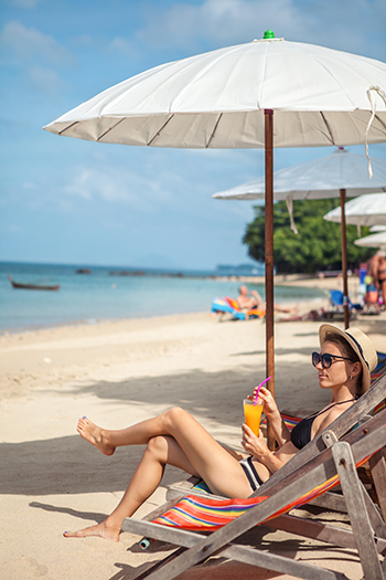 Client relaxing on beach